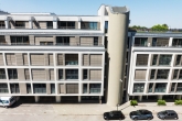 ALSAOL Immobilien: Extravagantes urbanes Apartment mit beheiztem Wintergarten in Toplage Bogenhausen - Außengebäude