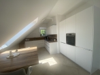 Neuwertige, edle 2-Zimmer-Dachgeschosswohnung mit Süd-West-Terrasse in Olching - Neu-Esting - Küche