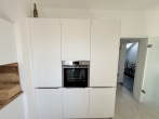 Neuwertige, edle 2-Zimmer-Dachgeschosswohnung mit Süd-West-Terrasse in Olching - Neu-Esting - Küche