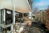 Rarität: Edle, hochwertige Gartenwohnung auf 2 Ebenen mit Süd-Terrasse im begehrten Obermenzing - sonnige Terrassenlounge