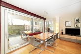Rarität: Edle, hochwertige Gartenwohnung auf 2 Ebenen mit Süd-Terrasse im begehrten Obermenzing - Blick zur Südterrasse