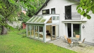 Doppelhaushälfte mit Einfamilienhauscharakter+uneinsehbarem SW-Garten in sehr guter Lage Bogenhausen - Blick vom Garten zum Wintergarten