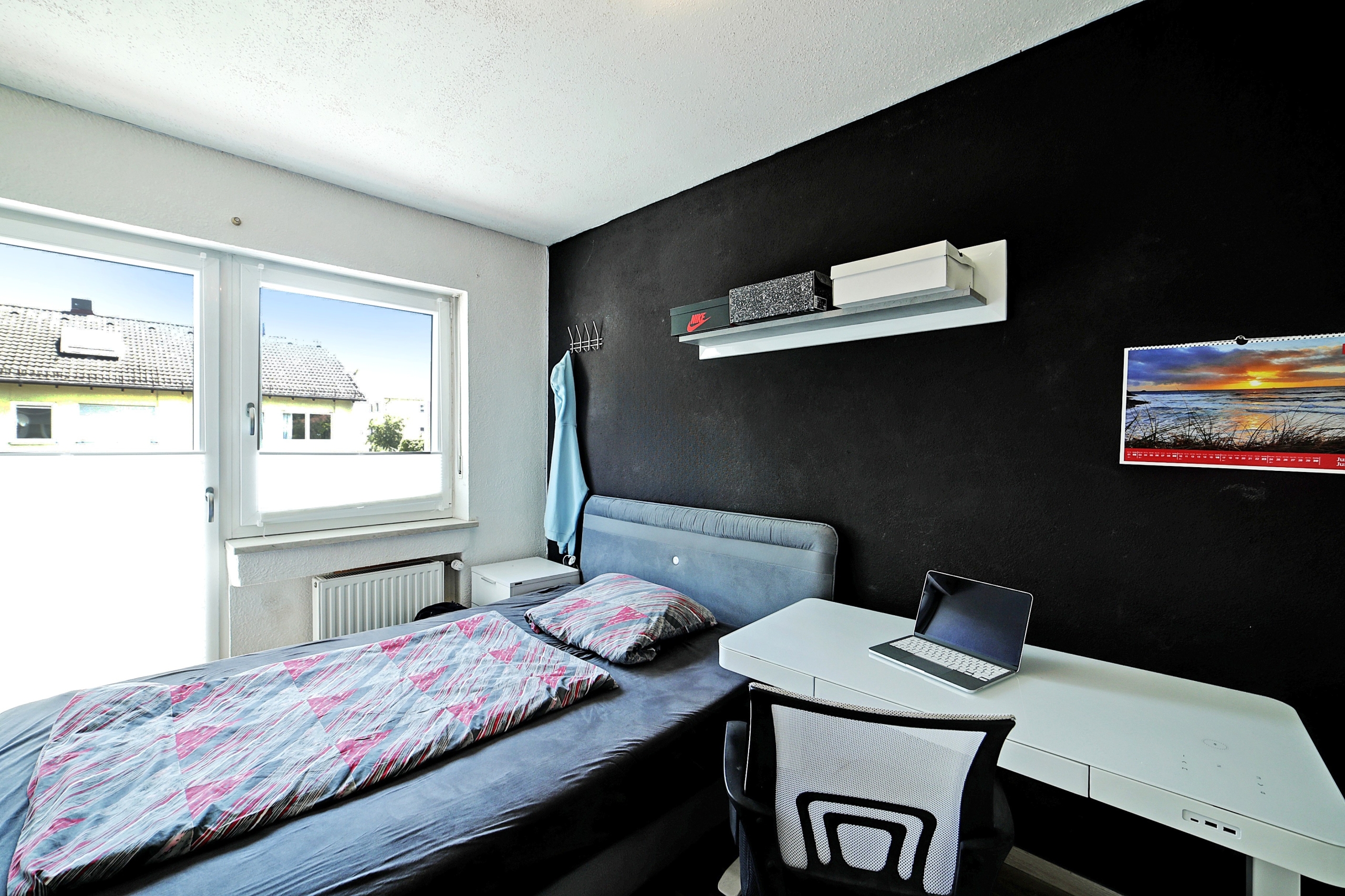 Schlafzimmer 2 im 1. OG
