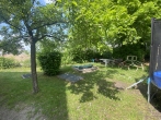 Gepflegte, gut geschnittene und helle 3 Zimmer-Wohnung mit Balkon in grüner Lage in Untermenzing! - Gemeinschaftsgarten im Sommer