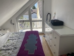 Helle, frisch renovierte 2 Zimmer Dachgeschosswohnung mit 2 Balkonen in Olching - Schlafzimmer