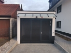 Neuwertige, gut geschnittene 2 Zimmer-Dachgeschoßwohnung in guter, zentraler Lage in Perlach! - Garagentor