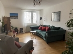 Gut geschnittene 3-Zimmerwohnung mit Altbau-Charme in bester Lage in Neuhausen! - Wohnzimmer