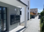 Neubau EBZ: traumhaftes sonniges Penthouse mit Süd-Dachterrasse in grüner, ruhiger Lage in Karlsfeld - Hauseingang