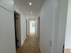 NEUBAU Erstbezug: Schicke sonnige 3 Zimmer Wohnung mit Süd- und Westbalkon in guter Lage Hadern ! - Flur