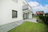 ERSTBEZUG: Bestlage in Karlsfeld- hochwertige, sonnige Neubau-Gartenwohnung mit Süd/West Terrasse! - Süd-West Terrasse