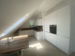Neuwertige, edle 2-Zimmer-Dachgeschosswohnung mit Süd-West-Terrasse in Olching - Neu-Esting - Küche