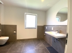 NB ERSTBEZUG: Hochwertige Gartenwohnung mit Terrasse+Südgarten in ruhiger, grüner Lage in Karlsfeld - Bad m. WM-Anschluss