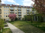 Alsaol Immobilien: Hochwertige, sanierte 3-Zimmer-Wohnung mit S/W-Balkon in Toplage Schwabing - Hausansicht Innenhof