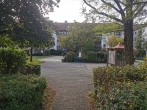 Charmante 2-Zimmer-Wohnung mit Wintergarten in Unterschleißheim - Innenhof