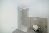 Neubau EBZ: schicke 2 Zimmer Wohnung mit sonnigem Süd-Balkon in sehr guter ruhiger Lage in Karlsfeld - Bad-begehbare Dusche